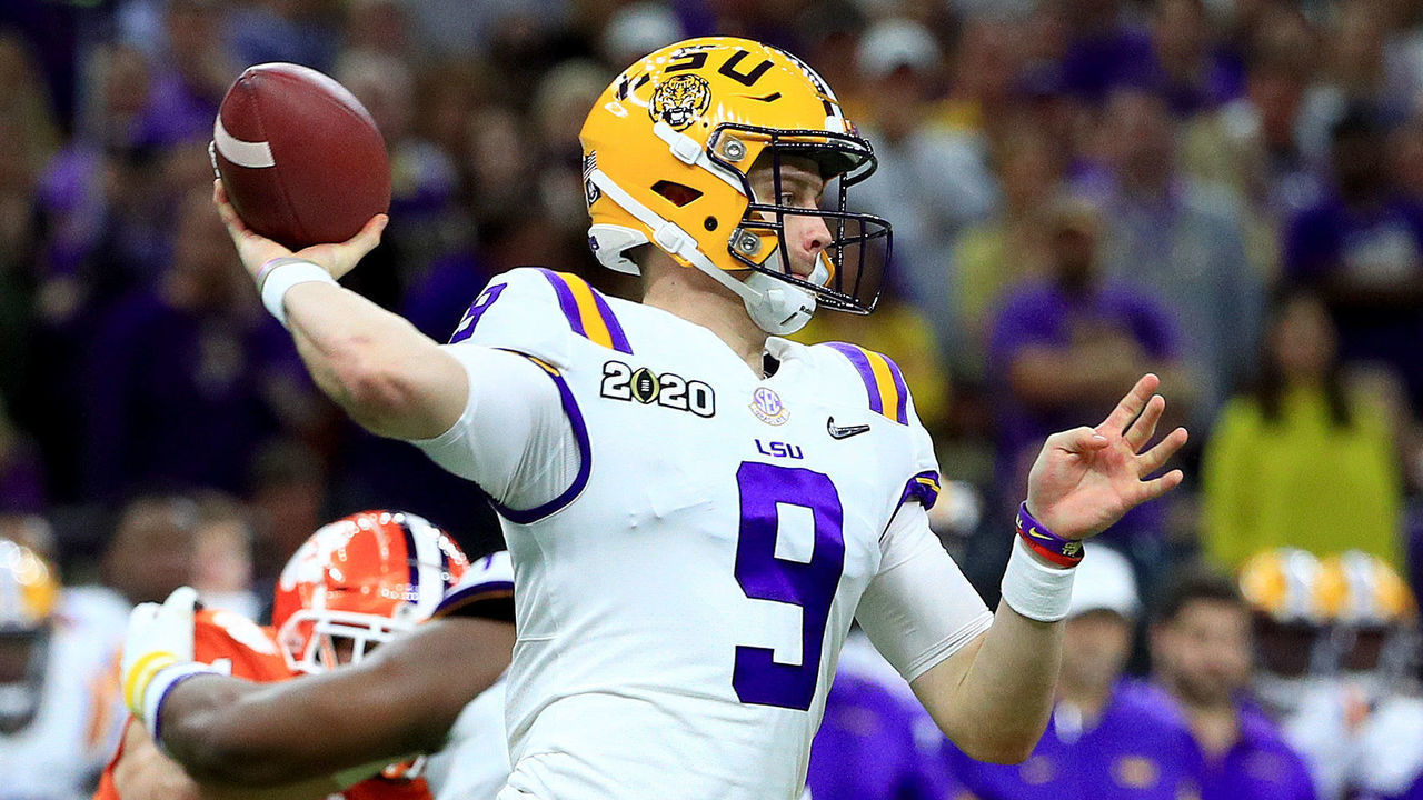 NEW ORLEANS, LOUISIANA - JANUARY 13: Joe Burrow #9 of the LSU Tigers throws the ball under pressure during the second quarter against the Clemson Tigers in the College Football Playoff National Championship game at Mercedes Benz Superdome on January 13, 2020 in New Orleans, Louisiana.