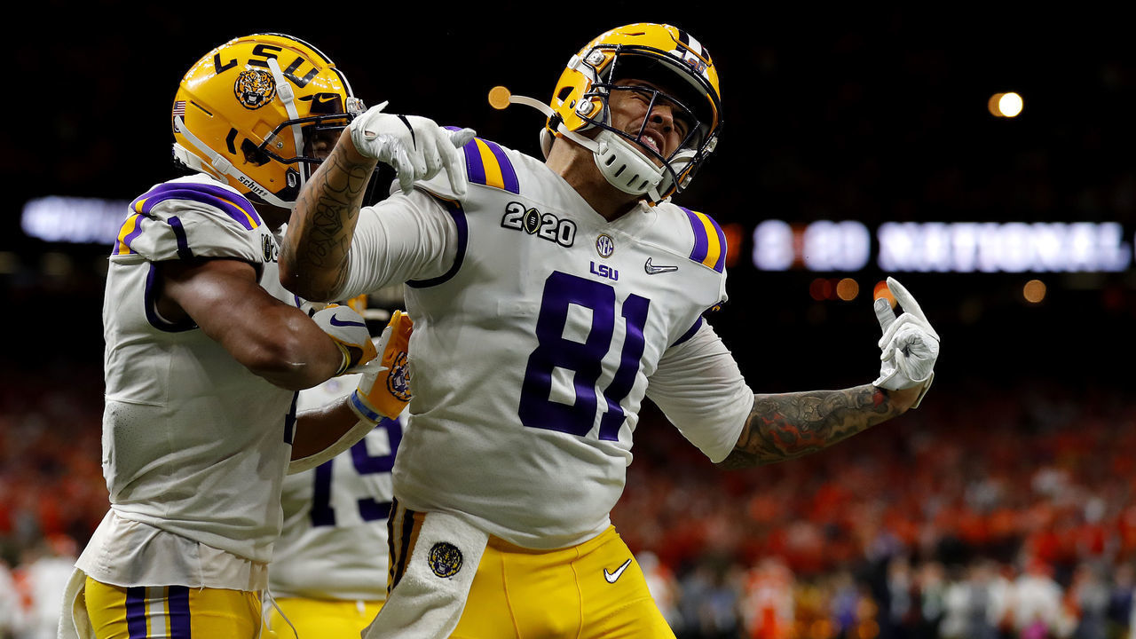 NEW ORLEANS, LOUISIANA - JANUARY 13: Thaddeus Moss #81 of the LSU Tigers celebrates after scoring a touchdown against the Clemson Tigers during the third quarter in the College Football Playoff National Championship game at Mercedes Benz Superdome on January 13, 2020 in New Orleans, Louisiana.