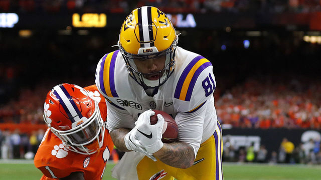 NEW ORLEANS, LOUISIANA - JANUARY 13: Thaddeus Moss #81 of the LSU Tigers scores a touchdown against the Clemson Tigers during the third quarter in the College Football Playoff National Championship game at Mercedes Benz Superdome on January 13, 2020 in New Orleans, Louisiana.