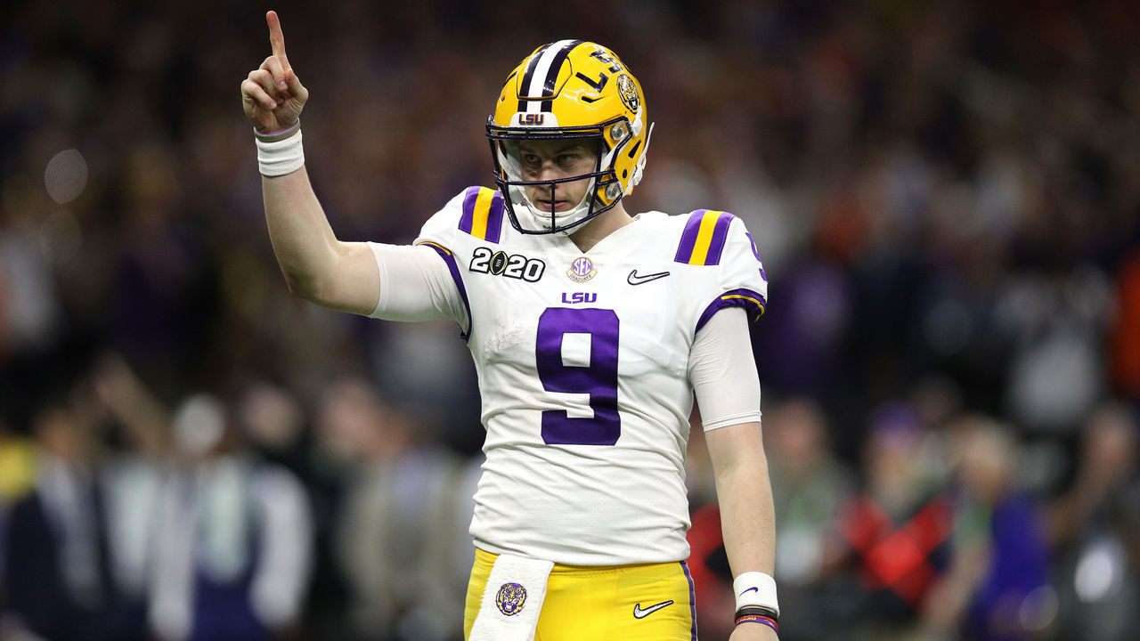 NEW ORLEANS, LOUISIANA - JANUARY 13: Joe Burrow #9 of the LSU Tigers reacts to a touchdown against Clemson Tigers during the third quarter in the College Football Playoff National Championship game at Mercedes Benz Superdome on January 13, 2020 in New Orleans, Louisiana.