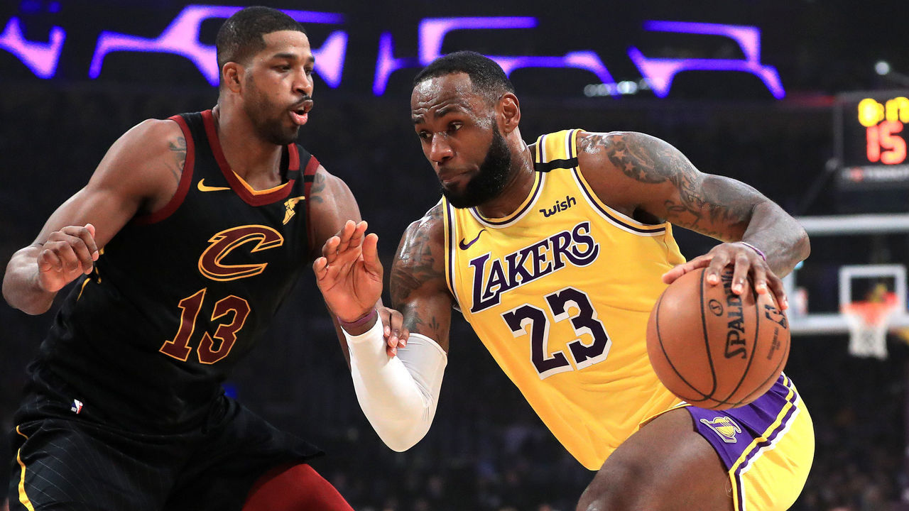LOS ANGELES, CALIFORNIA - JANUARY 13: LeBron James #23 of the Los Angeles Lakers dribbles past the defense of Tristan Thompson #13 of the Cleveland Cavaliers during the first half of a game at Staples Center on January 13, 2020 in Los Angeles, California. NOTE TO USER: User expressly acknowledges and agrees that, by downloading and/or using this photograph, user is consenting to the terms and conditions of the Getty Images License Agreement.