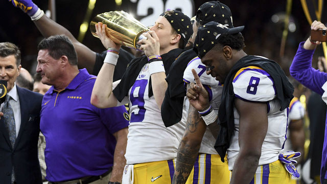 NEW ORLEANS, LA - JANUARY 13: Joe Burrow #9 of the LSU Tigers celebrates after defeating the Clemson Tigers during the College Football Playoff National Championship held at the Mercedes-Benz Superdome on January 13, 2020 in New Orleans, Louisiana.