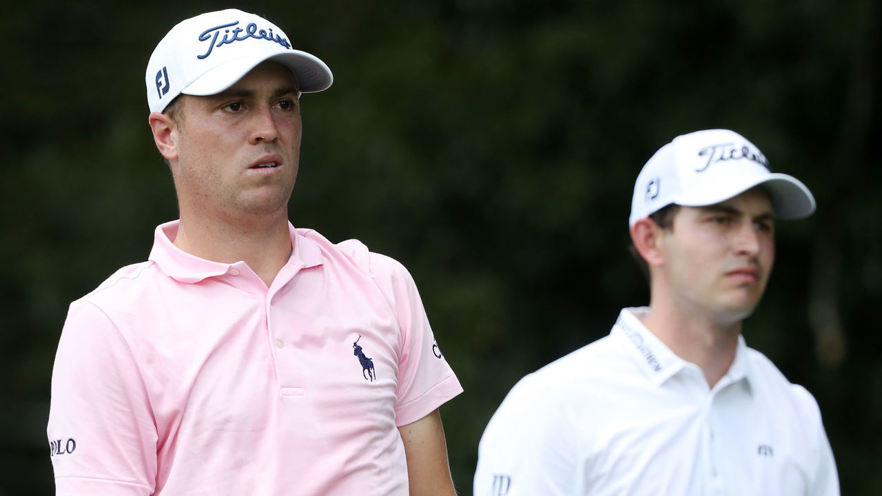 ATLANTA, GEORGIA - AUGUST 22: Justin Thomas of the United States and Patrick Cantlay of the United States look on from the second tee during the first round of the TOUR Championship at East Lake Golf Club on August 22, 2019 in Atlanta, Georgia.