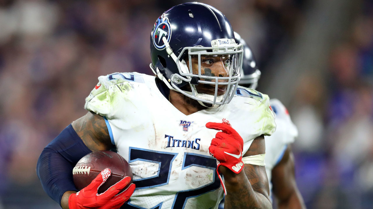 BALTIMORE, MARYLAND - JANUARY 11: Derrick Henry #22 of the Tennessee Titans carries the ball during the second half against the Baltimore Ravens in the AFC Divisional Playoff game at M&T Bank Stadium on January 11, 2020 in Baltimore, Maryland.