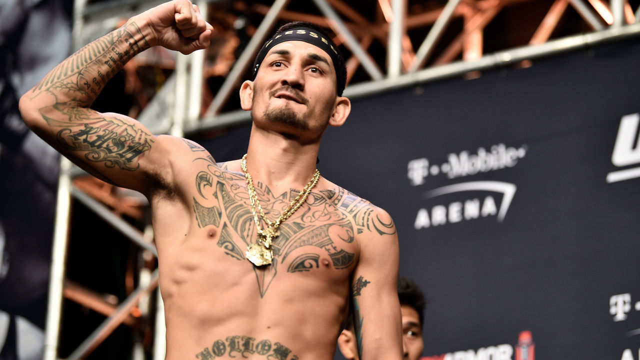 LAS VEGAS, NEVADA - DECEMBER 13: Max Holloway stands on stage during the UFC 245 Weigh-Ins at T-Mobile Arena on December 13, 2019 in Las Vegas, Nevada.