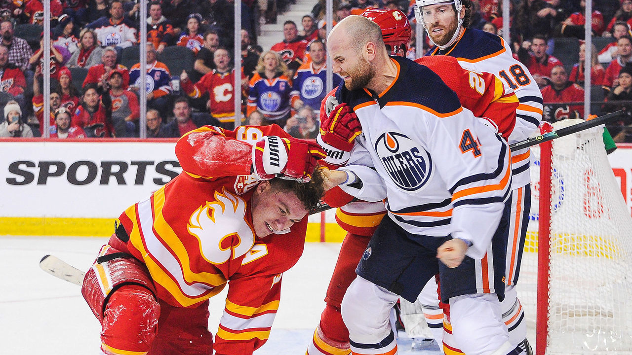 CALGARY, AB - JANUARY 11: Zack Kassian #44 of the Edmonton Oilers fights Matthew Tkachuk #19 of the Calgary Flames during an NHL game at Scotiabank Saddledome on January 11, 2020 in Calgary, Alberta, Canada.