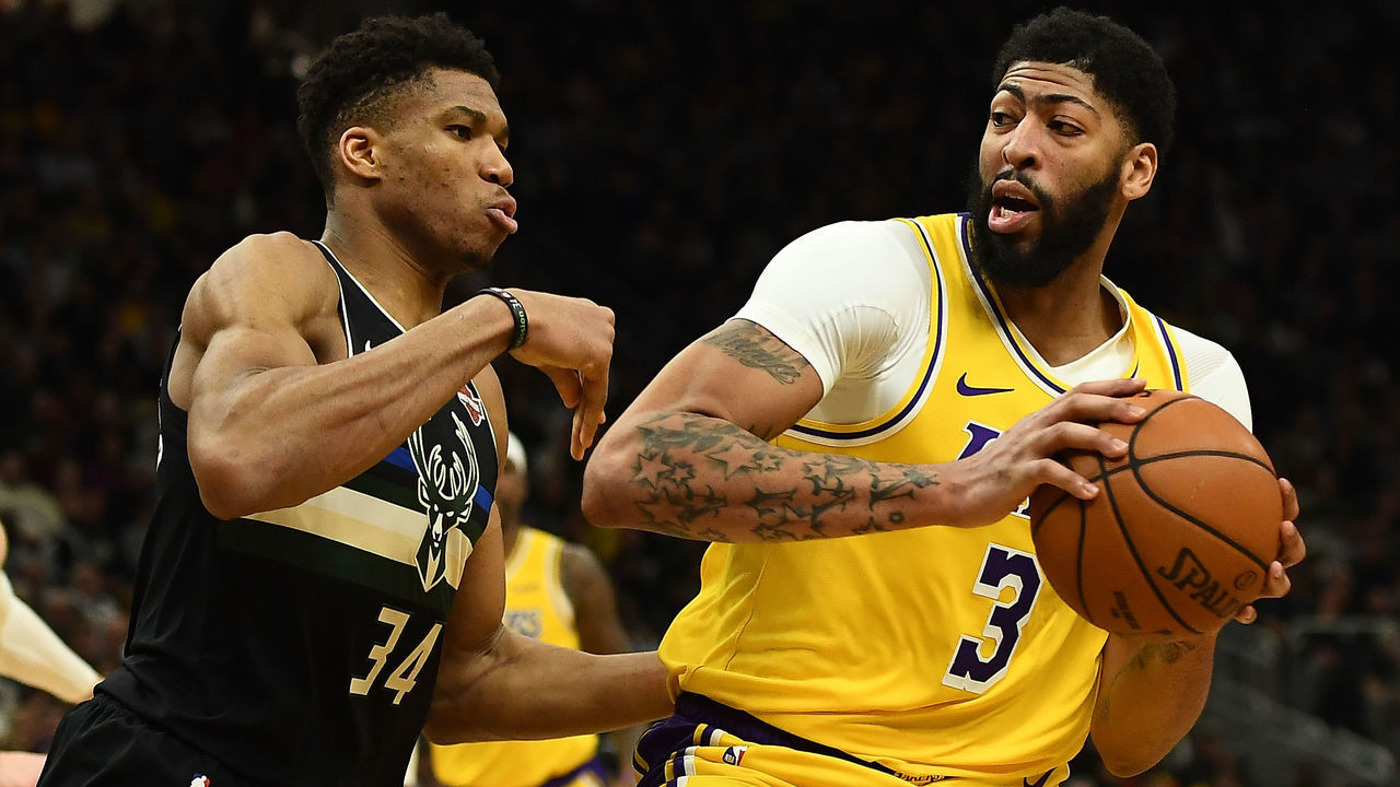 MILWAUKEE, WISCONSIN - DECEMBER 19: Anthony Davis #3 of the Los Angeles Lakers is defended by Giannis Antetokounmpo #34 of the Milwaukee Bucks during the second half of a game at Fiserv Forum on December 19, 2019 in Milwaukee, Wisconsin.