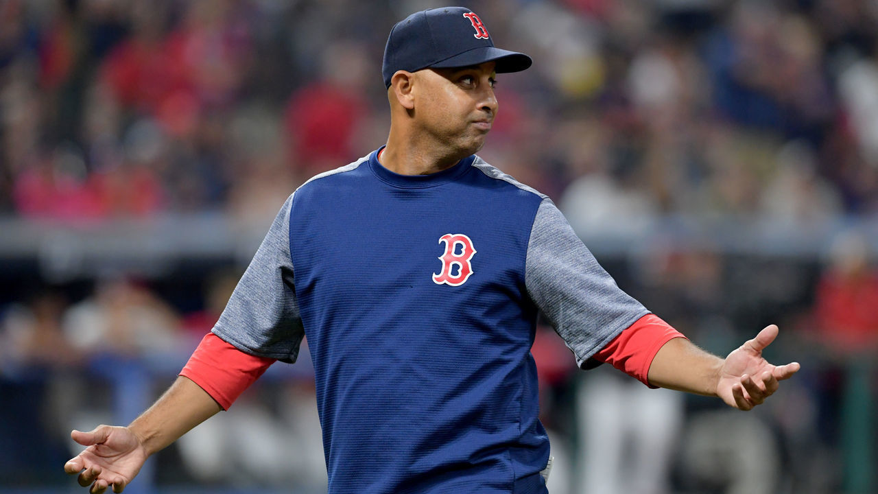 CLEVELAND, OHIO - AUGUST 13: Alex Cora #20 of the Boston Red Sox reacts after arguing a call during the eighth inning against the Cleveland Indians at Progressive Field on August 13, 2019 in Cleveland, Ohio.