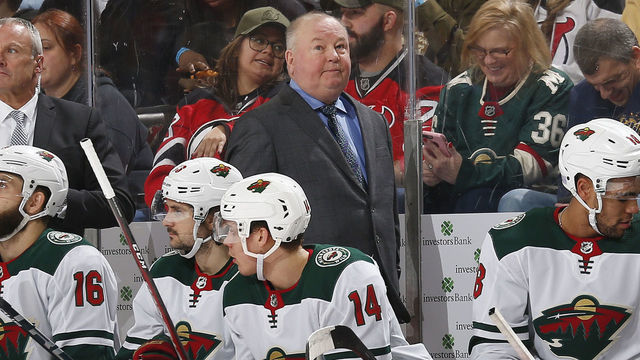 NEWARK, NJ - NOVEMBER 26: Head Coach of the Minnesota Wild Bruce Boudreau looks on from behind the bench during the game against the New Jersey Devils at the Prudential Center on November 26, 2019 in Newark, New Jersey.