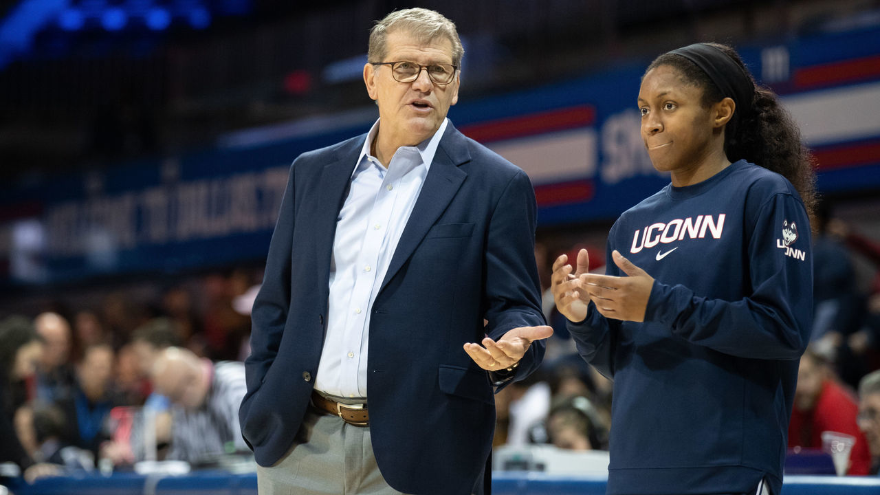 DALLAS, TX - JANUARY 05: UConn Huskies head coach Geno Auriemma talks to point guard Crystal Dangerfield (#5) during the American Athletic Conference womens college basketball game between the UConn Huskies and the SMU Mustangs on January 05, 2020 at Moody Coliseum in Dallas, Texas.