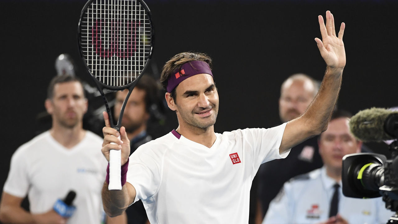 Roger Federer of Switzerland waves to the crowds as he and the world's top players play in the Rally for Relief charity tennis match in support of the victims of the Australian bushfires, in Melbourne of January 15, 2020, ahead of the Australian Open tennis tournament.