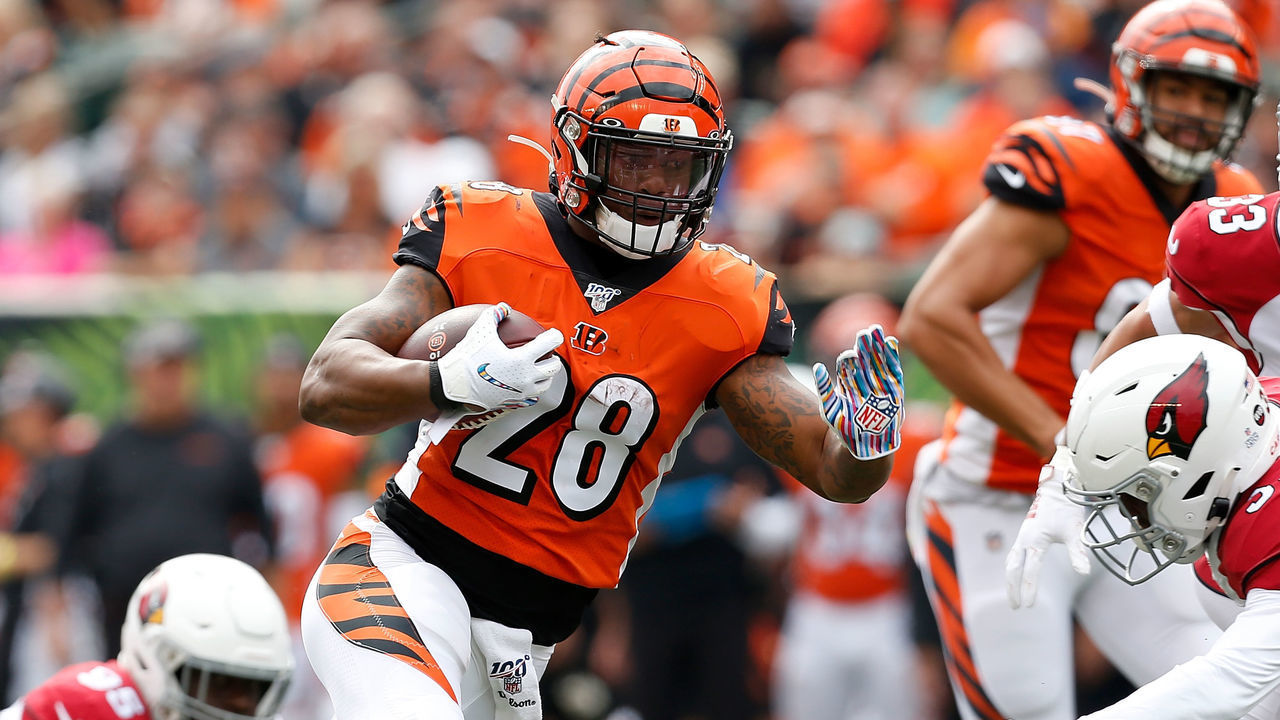 CINCINNATI, OH - OCTOBER 6: Joe Mixon #28 of the Cincinnati Bengals runs the ball past Jalen Thompson #34 of the Arizona Cardinals during the first quarter at Paul Brown Stadium on October 6, 2019 in Cincinnati, Ohio.