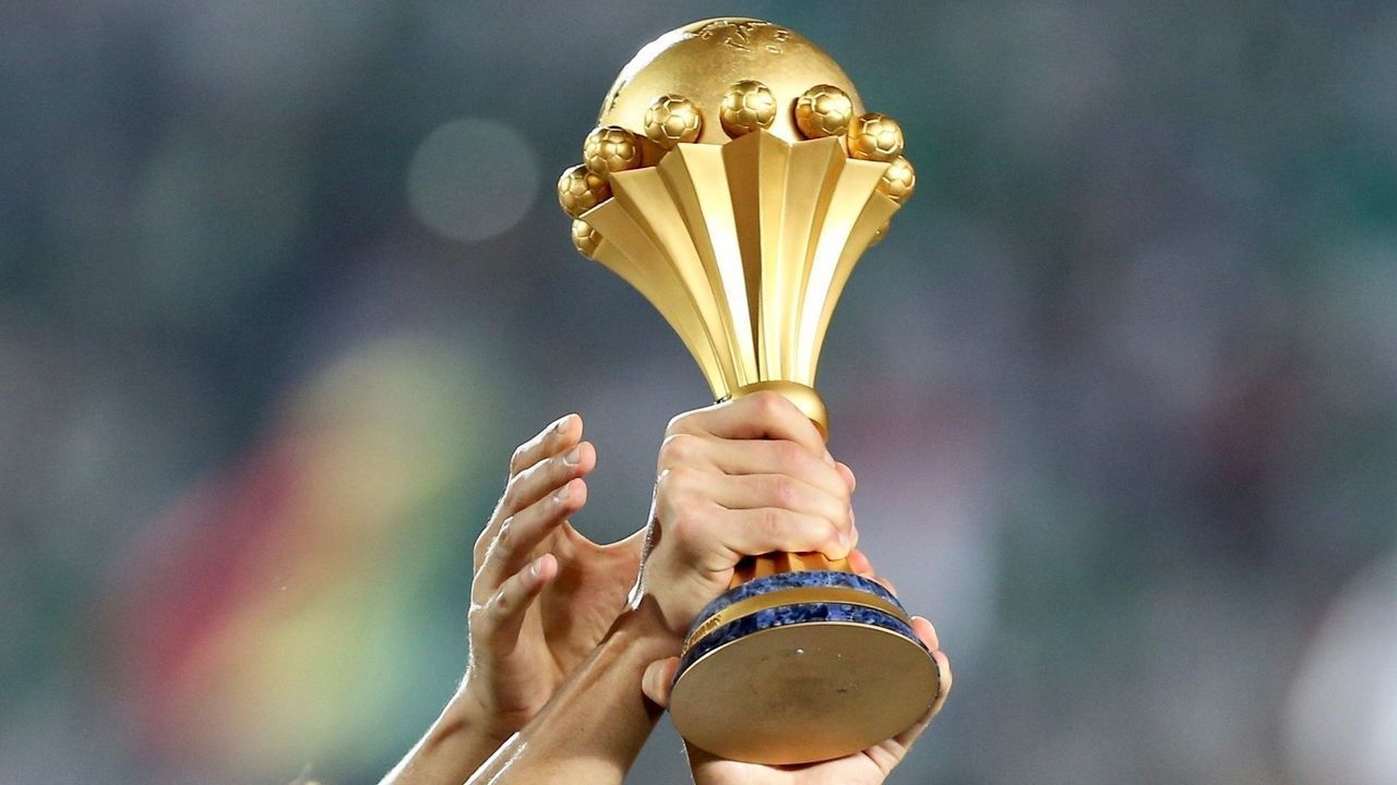 CAIRO, EGYPT - JULY 19: Algerian team celebrate championship with trophy after the 2019 Africa Cup of Nations final match between Senegal and Algeria at the Cairo Stadium in Cairo, Egypt on July 19, 2019. Algeria won their first Africa Cup of Nations (AFCON) title in 29 years, beating Senegal 1-0 late Friday in Egypt.