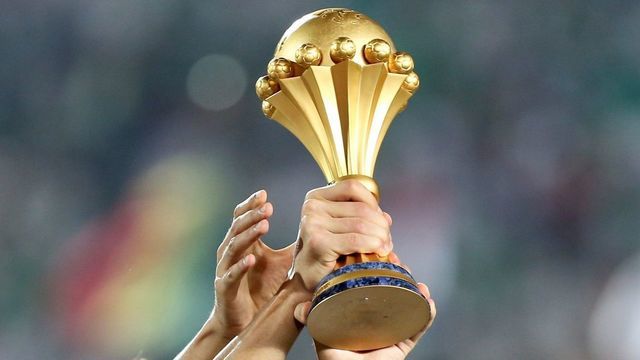 CAIRO, EGYPT - JULY 19: Algerian team celebrate championship with trophy after the 2019 Africa Cup of Nations final match between Senegal and Algeria at the Cairo Stadium in Cairo, Egypt on July 19, 2019. Algeria won their first Africa Cup of Nations (AFCON) title in 29 years, beating Senegal 1-0 late Friday in Egypt.