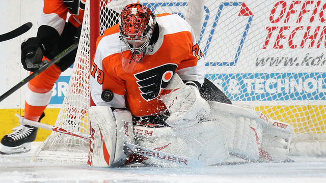 PHILADELPHIA, PA - JANUARY 13: Carter Hart #79 of the Philadelphia Flyers protects his net as the loose puck rides up his arm in the first period against the Boston Bruins on January 13, 2020 at the Wells Fargo Center in Philadelphia, Pennsylvania.
