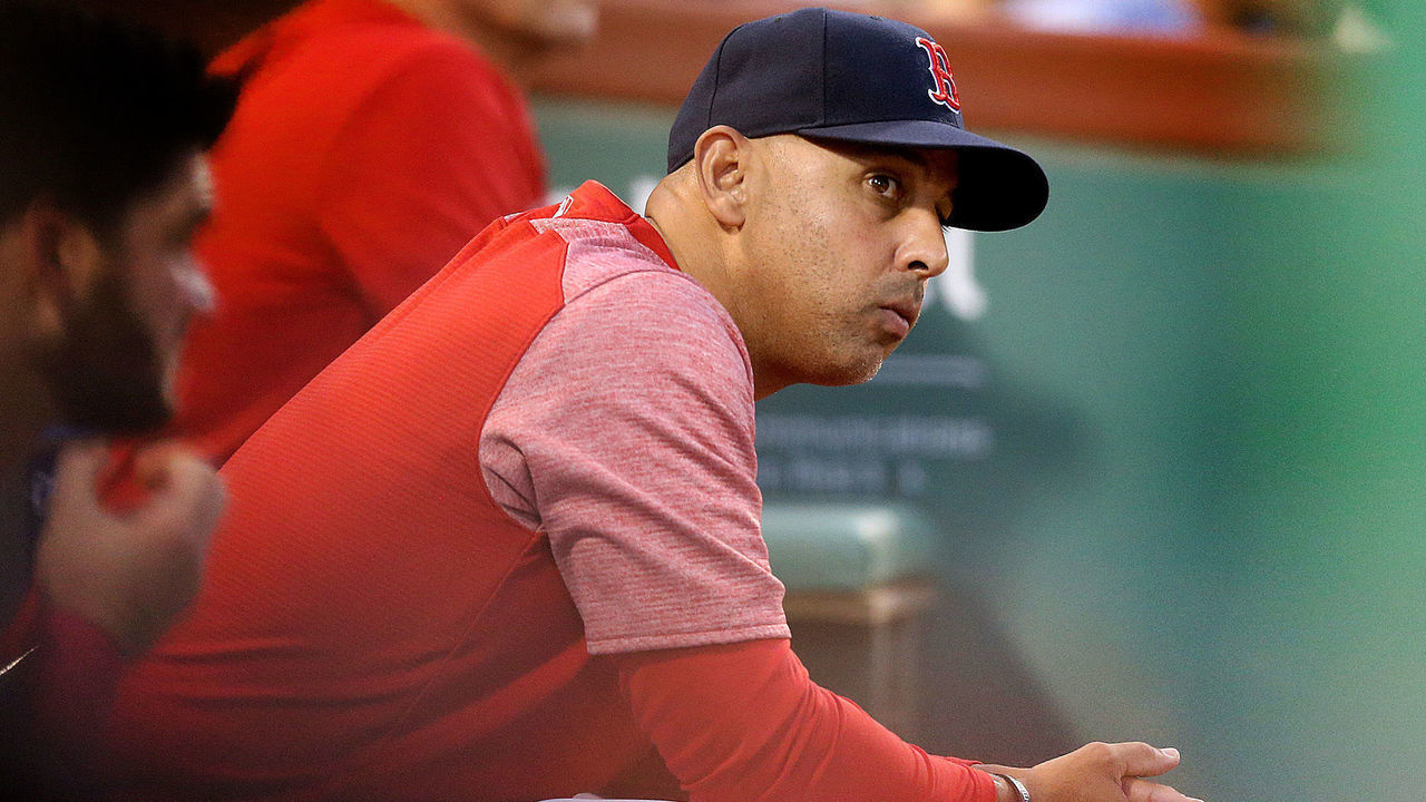 BOSTON, MA. - AUGUST 1: Alex Cora #20 of the Boston Red Sox sits in the dugout during the second inning of the MLB game against the Tampa Bay Rays at Fenway Park on August 1, 2019 in Boston, Massachusetts. (Staff Photo By Matt Stone/MediaNews Group/Boston Herald)