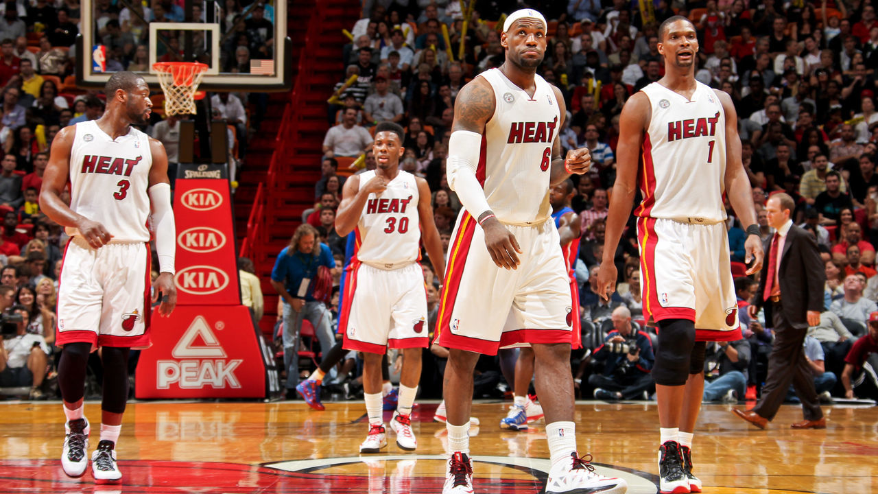 MIAMI, FL - JANUARY 25: Miami Heat players, from left, Dwyane Wade #3, Norris Cole #30, LeBron James #6 and Chris Bosh #1 walk to the sideline for a timeout during a game against the Detroit Pistons on January 25, 2013 at American Airlines Arena in Miami, Florida. NOTE TO USER: User expressly acknowledges and agrees that, by downloading and/or using this photograph, user is consenting to the terms and conditions of the Getty Images License Agreement. Mandatory copyright notice: Copyright NBAE 2013