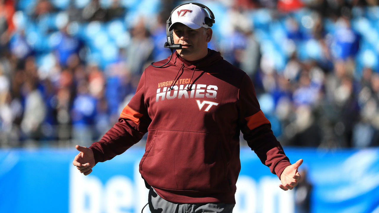 CHARLOTTE, NORTH CAROLINA - DECEMBER 31: Head coach Justin Fuente of the Virginia Tech Hokies watches on against the Kentucky Wildcats during the Belk Bowl at Bank of America Stadium on December 31, 2019 in Charlotte, North Carolina.