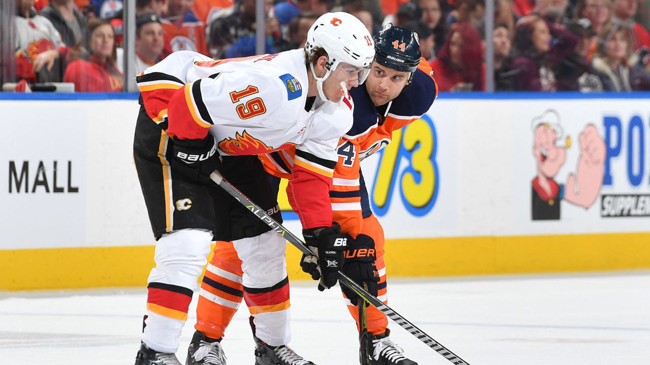 EDMONTON, AB - JANUARY 25: Zack Kassian #44 of the Edmonton Oilers lines up for a face off with Matthew Tkachuk #19 of the Calgary Flames on January 25, 2017 at Rogers Place in Edmonton, Alberta, Canada.