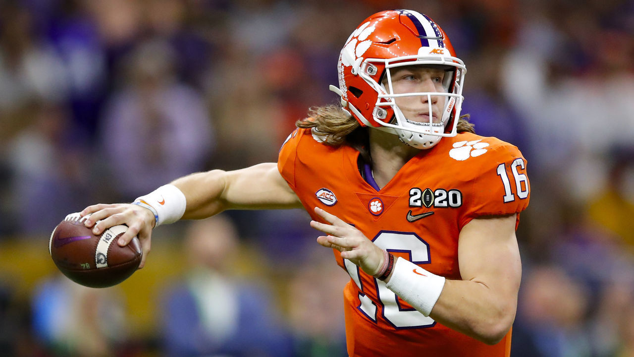 NEW ORLEANS, LA - JANUARY 13: Clemson Tigers quarterback Trevor Lawrence (16) rolls out to pass during the second half of the College Football Playoff National Championship Game between the LSU Tigers and the Clemson Tigers on January 13, 2020 in New Orleans LA.