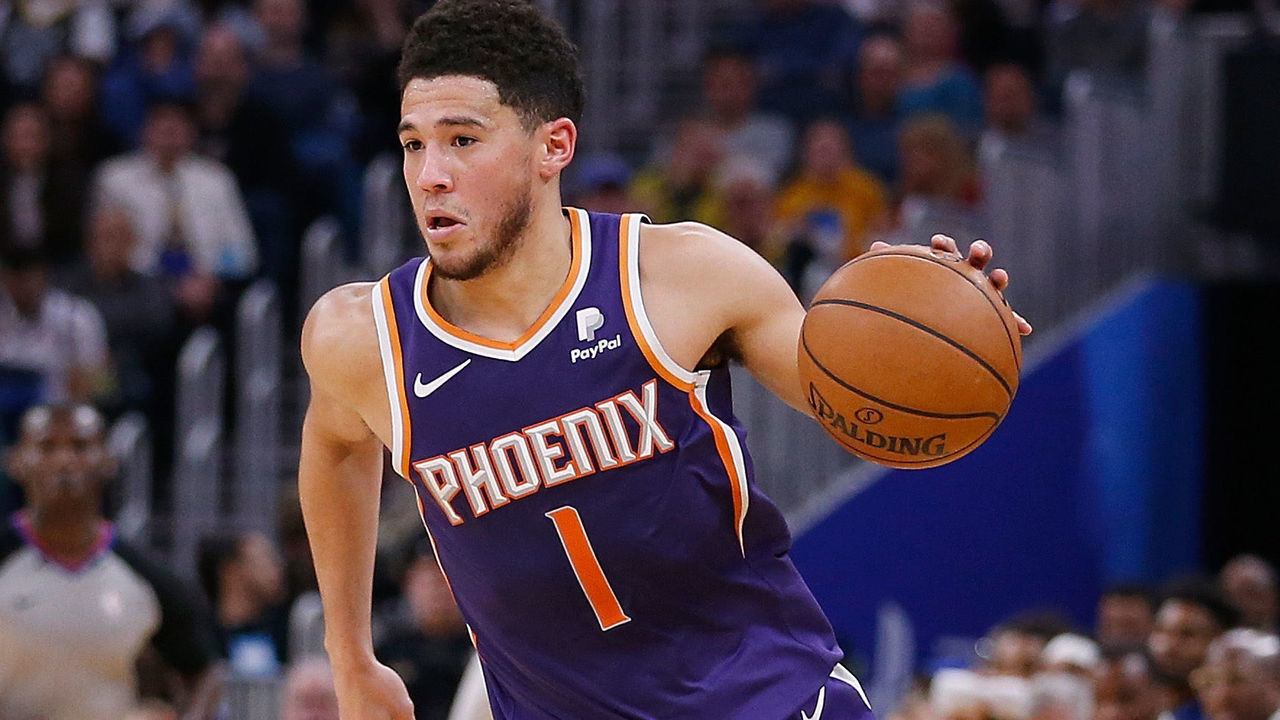 SAN FRANCISCO, CALIFORNIA - DECEMBER 27: Devin Booker #1 of the Phoenix Suns drives to the basket in the second half against the Golden State Warriors at Chase Center on December 27, 2019 in San Francisco, California. NOTE TO USER: User expressly acknowledges and agrees that, by downloading and/or using this photograph, user is consenting to the terms and conditions of the Getty Images License Agreement.