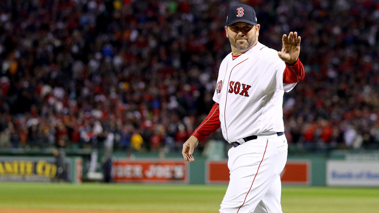 BOSTON, MA - OCTOBER 24: Former Boston Red Sox player Jason Varitek throws out the ceremonial first pitch with his former teammates prior to Game Two of the 2018 World Series between the Boston Red Sox and the Los Angeles Dodgers at Fenway Park on October 24, 2018 in Boston, Massachusetts.