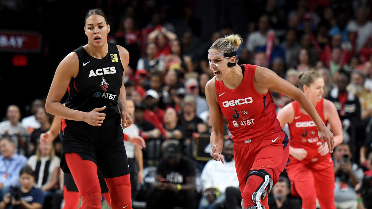 LAS VEGAS, NEVADA - SEPTEMBER 24: Liz Cambage #8 of the Las Vegas Aces looks on as Elena Delle Donne #11 of the Washington Mystics reacts after the team scored against the Aces during Game Four of the 2019 WNBA Playoff semifinals at the Mandalay Bay Events Center on September 24, 2019 in Las Vegas, Nevada. The Mystics defeated the Aces 94-90 and won the series 3-1.