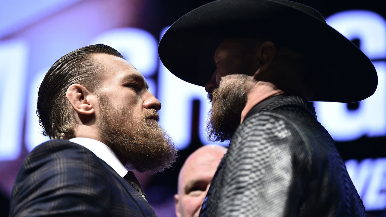 LAS VEGAS, NEVADA - JANUARY 15: (L-R) Conor McGregor of Ireland and Donald Cerrone face off during the UFC 246 press conference at Pearl Theater at the Palms Casino Resort on January 15, 2020 in Las Vegas, Nevada.