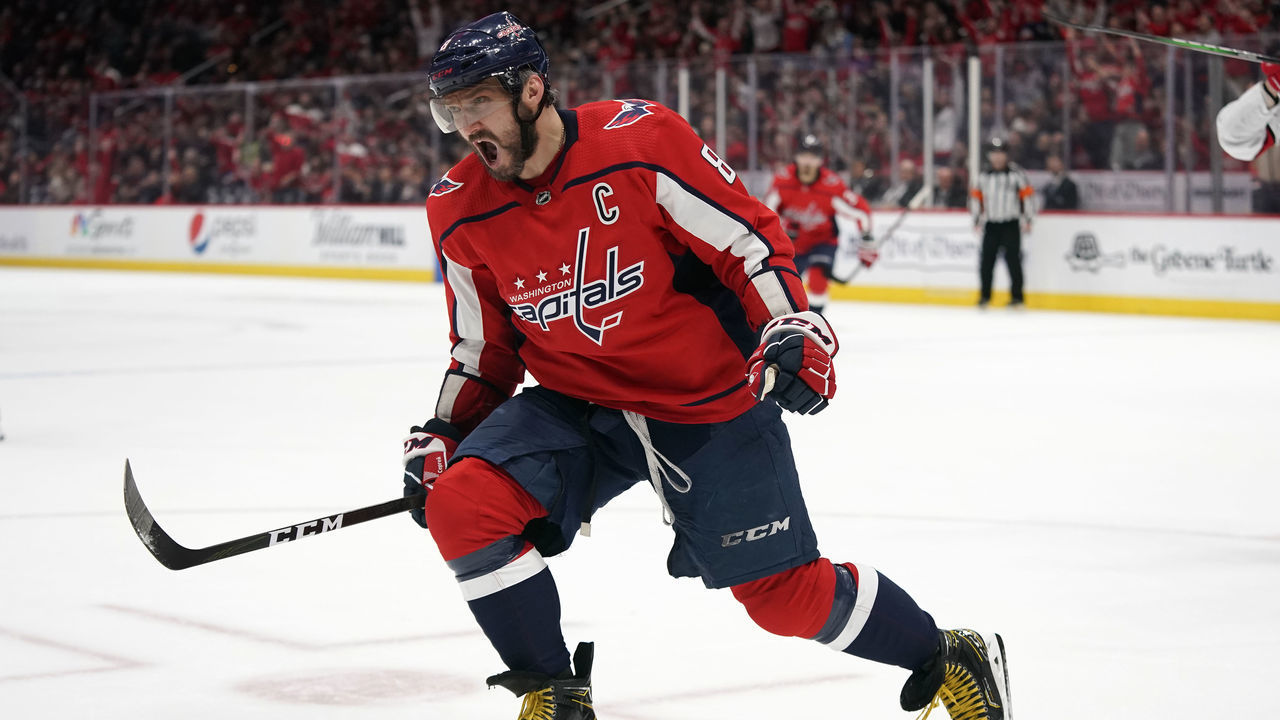 WASHINGTON, DC - JANUARY 13: Alex Ovechkin #8 of the Washington Capitals celebrates after scoring his first goal of the game in the first period against the Carolina Hurricanes at Capital One Arena on January 13, 2020 in Washington, DC.