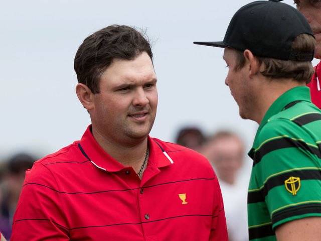 MELBOURNE, VIC - DECEMBER 15: Patrick Reed of team USA shakes Cameron Smith of Australia hand during the final round of The Presidents Cup at Royal Melbourne Golf Club on December 15, 2019 in Melbourne, Australia.