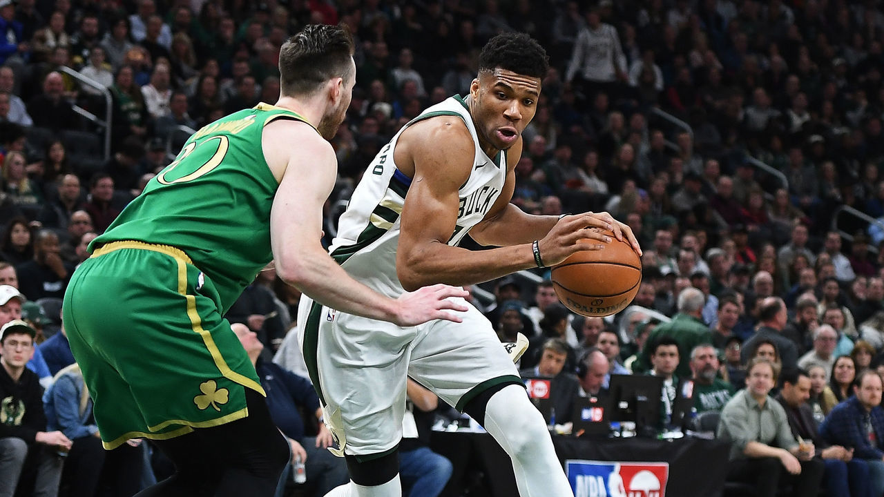 MILWAUKEE, WISCONSIN - JANUARY 16: Giannis Antetokounmpo #34 of the Milwaukee Bucks is defended by Gordon Hayward #20 of the Boston Celtics during the second half of a game at Fiserv Forum on January 16, 2020 in Milwaukee, Wisconsin.