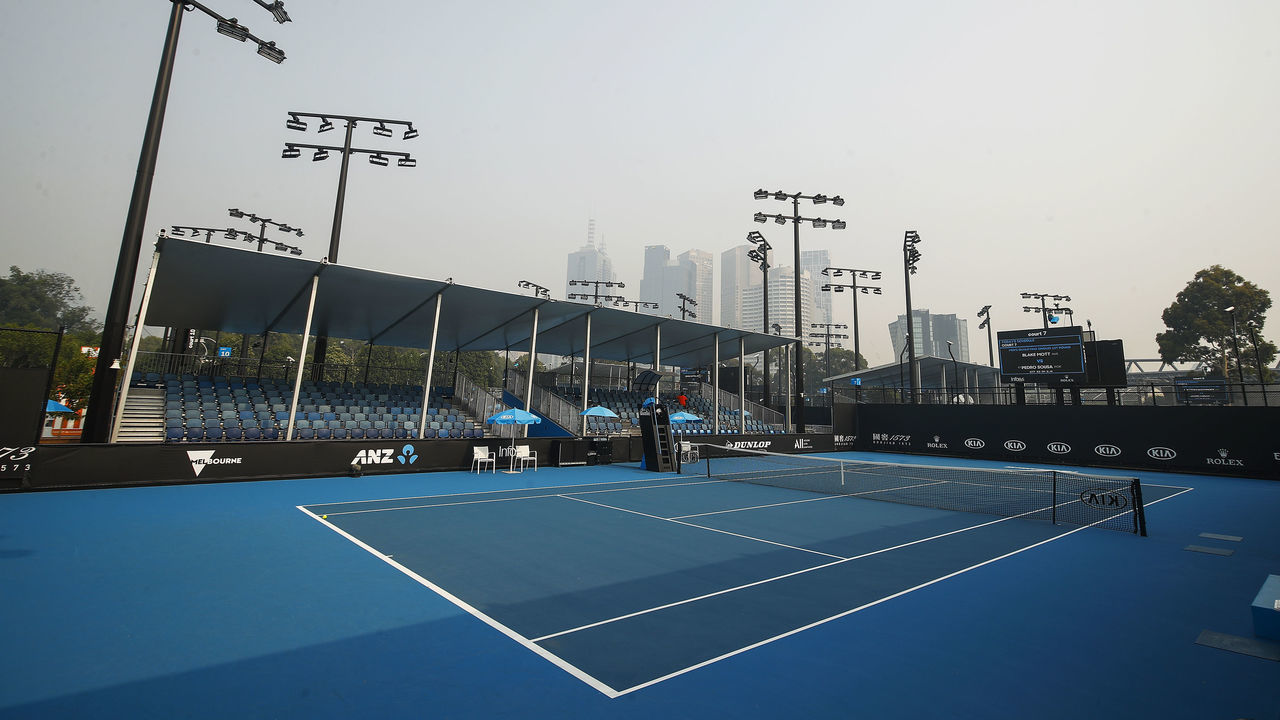 MELBOURNE, AUSTRALIA - JANUARY 14: A Show Court is seen with the city shrouded in smoke ahead of the 2020 Australian Open at Melbourne Park on January 14, 2020 in Melbourne, Australia.