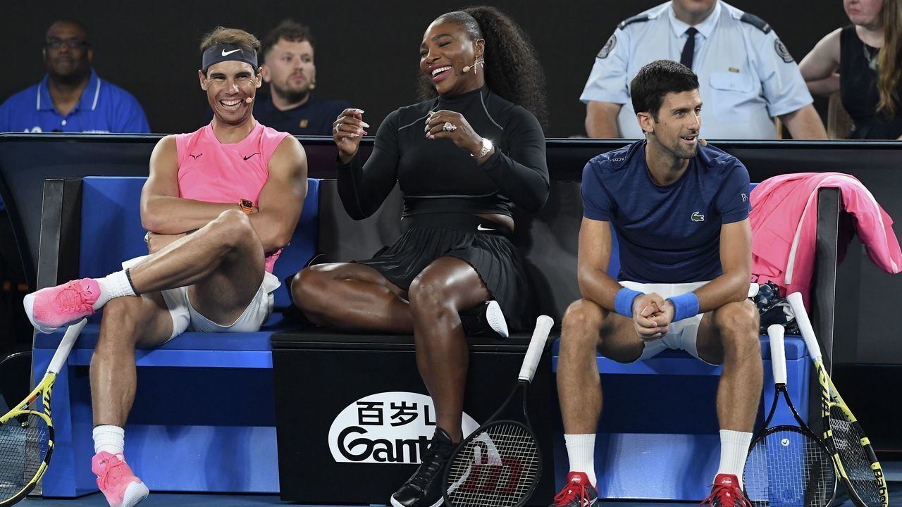 TOPSHOT - Serena Williams of the US (C) shares a lighter moment with Rafael Nadal of Spain (L) and Novak Djokovic of Serbia (R) as they and other top players play in the Rally for Relief charity tennis match in support of the victims of the Australian bushfires, in Melbourne of January 15, 2020, ahead of the Australian Open tennis tournament.