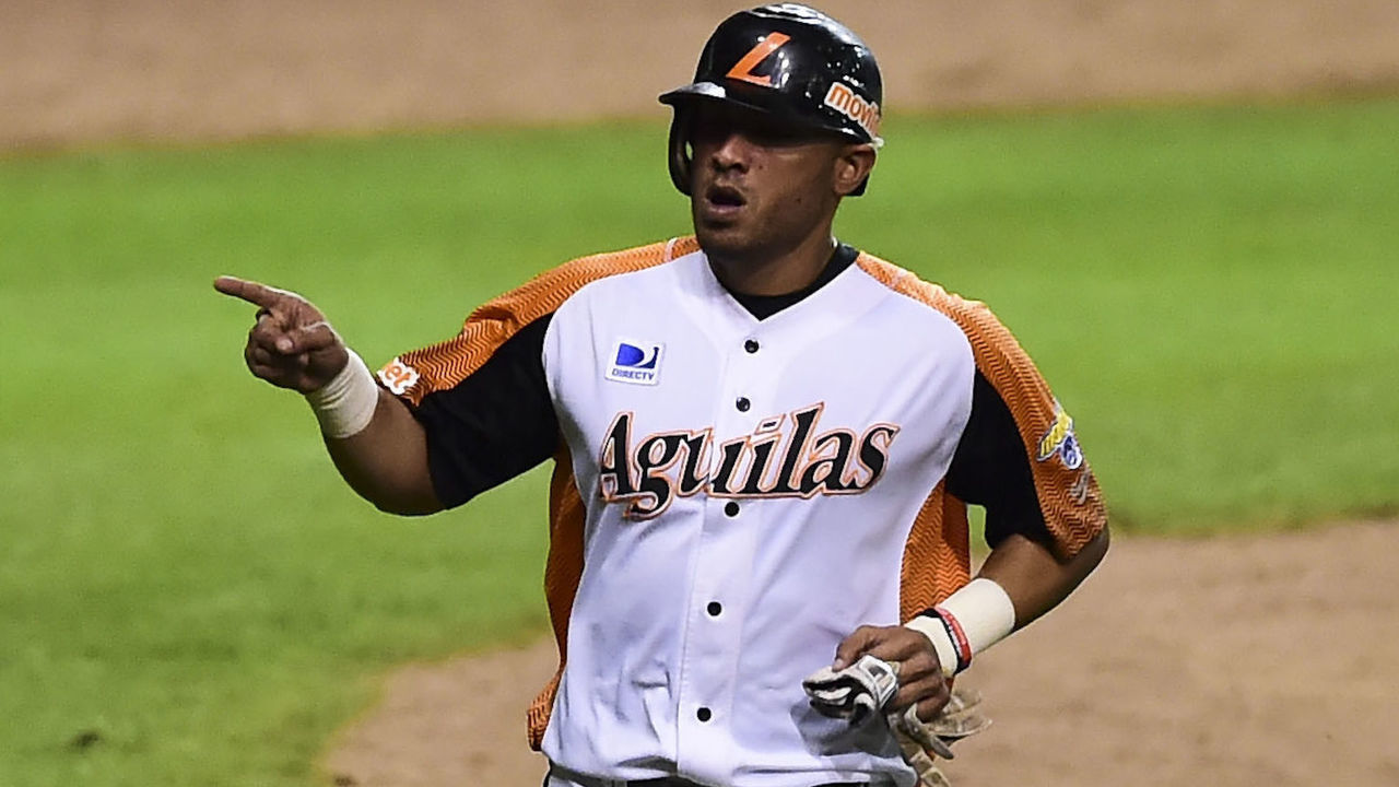 Alex Romero of Aguilas del Zulia from Venezuela celebrates after scoring against Alazanes de Granma from Cuba during their Caribbean Baseball Series at the Tomateros stadium in Culiacan, Sinaloa State, Mexico, on February 4, 2017. / AFP / RONALDO SCHEMIDT