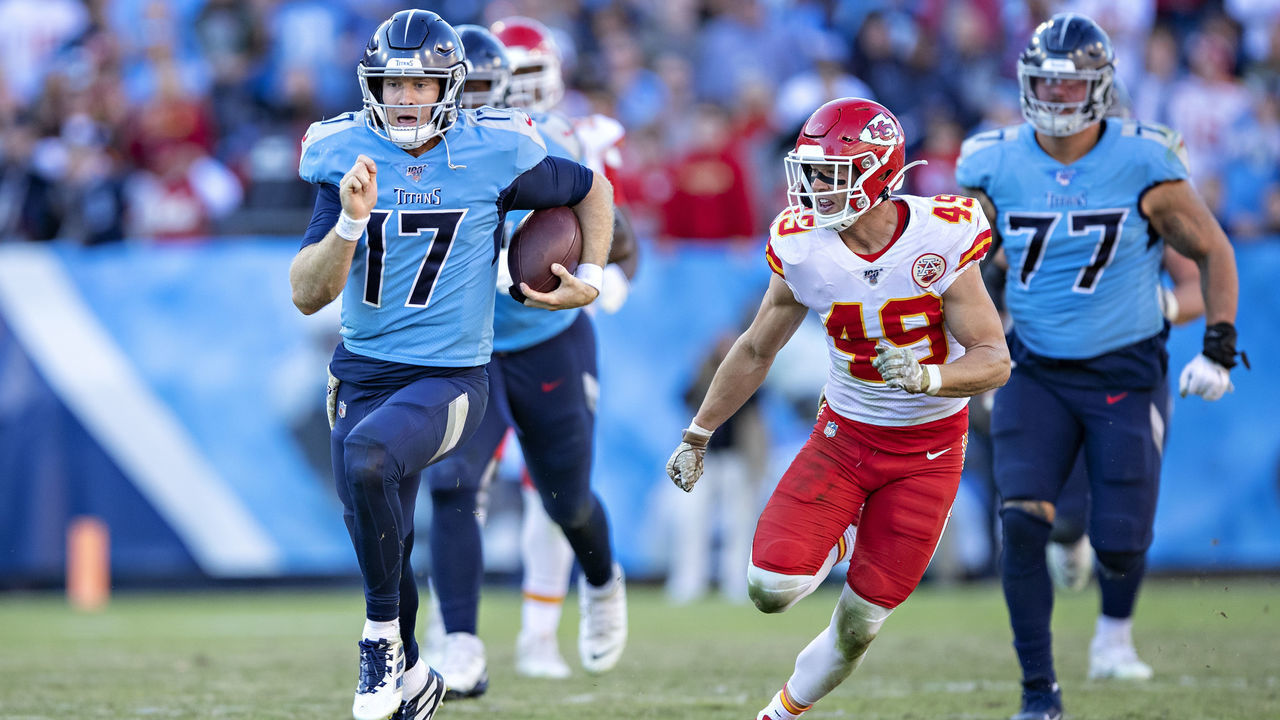NASHVILLE, TN - NOVEMBER 10: Ryan Tannehill #17 of the Tennessee Titans runs the ball and is chased by Daniel Sorensen #49 of the Kansas City Chiefs at Nissan Stadium on November 10, 2019 in Nashville, Tennessee. The Titans defeated the Chiefs 35-32.