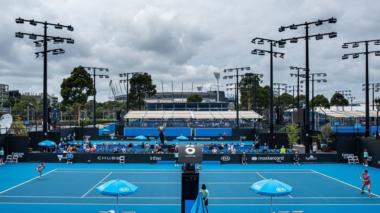 A general view of the outside courts at Melbourne Park as dark clouds hover over Melbourne, following a large downpour and thunderstorms overnight in Melbourne on January 16, 2020, ahead of the Australian Open tennis tournament.