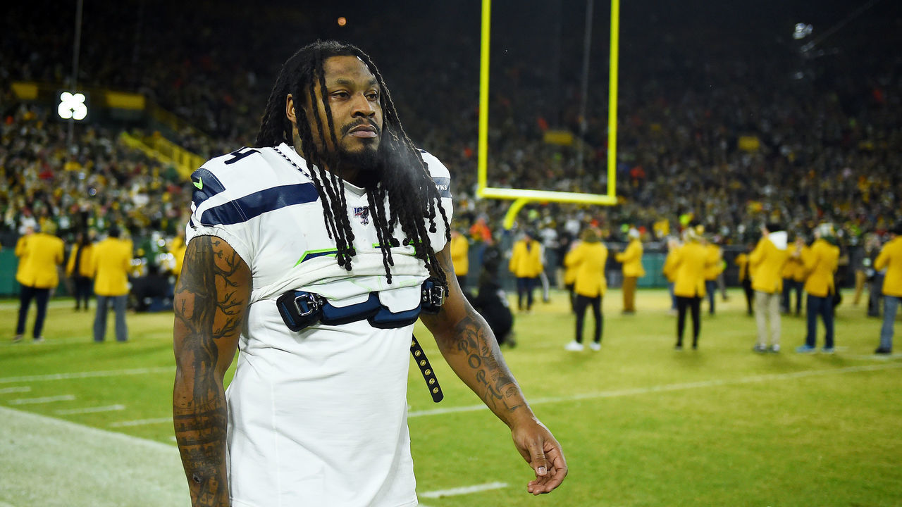 GREEN BAY, WISCONSIN - JANUARY 12: Marshawn Lynch #24 of the Seattle Seahawks looks on before the NFC Divisional Playoff game against the Green Bay Packers at Lambeau Field on January 12, 2020 in Green Bay, Wisconsin.