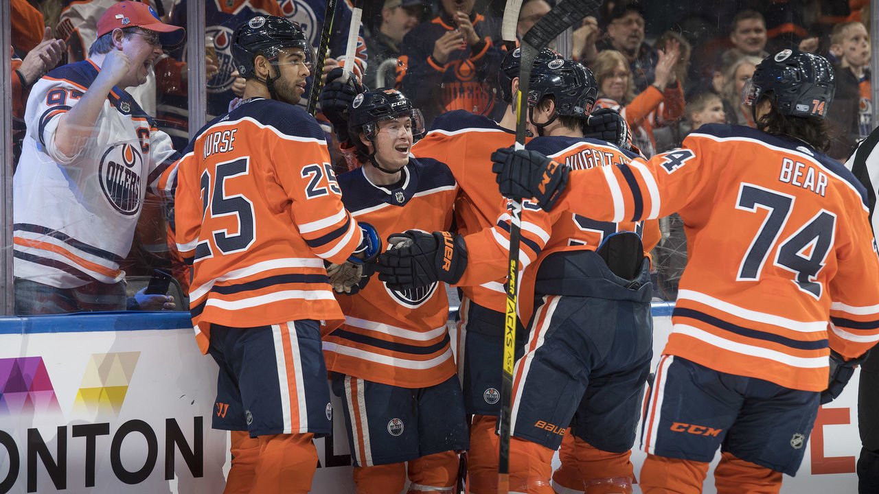 EDMONTON, AB - JANUARY 18: Darnell Nurse #25, Kailer Yamamoto #56, Ryan Nugent-Hopkins #93 and Ethan Bear #74 of the Edmonton Oilers celebrate a goal against the Arizona Coyotes on January 18, 2020, at Rogers Place in Edmonton, Alberta, Canada.
