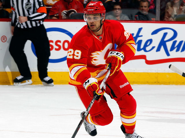 CALGARY, CANADA - APRIL 7: Akim Aliu #29 of the Calgary Flames skates the Anaheim Ducks on April 7, 2012 at the Scotiabank Saddledome in Calgary, Alberta, Canada. The Flames won 5-2.