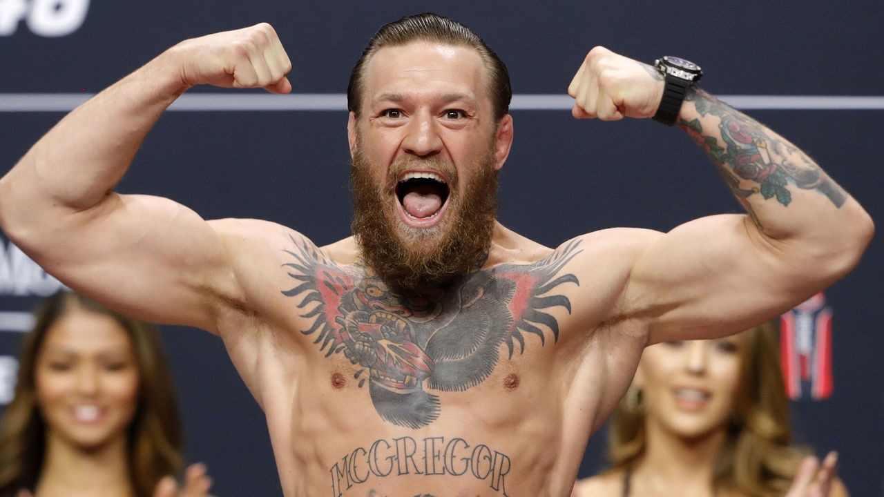 LAS VEGAS, NEVADA - JANUARY 17: Welterweight fighter Conor McGregor poses on the scale during a ceremonial weigh-in for UFC 246 at Park Theater at Park MGM on January 17, 2020 in Las Vegas, Nevada. McGregor will face Donald Cerrone at UFC 246 on January 18 in Las Vegas.