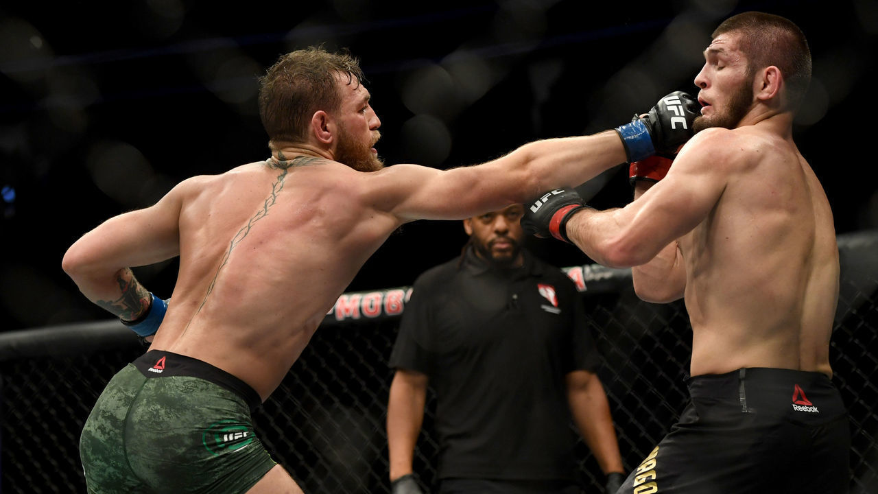 LAS VEGAS, CA - OCTOBER 06: Conor McGregor lands a punch to the face of Khabib Nurmagomedov during UFC 229 at the T-Mobile Arena in Las Vegas, Nev. Friday, Oct. 6, 2018.