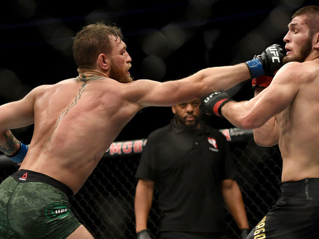 LAS VEGAS, CA - OCTOBER 06: Conor McGregor lands a punch to the face of Khabib Nurmagomedov during UFC 229 at the T-Mobile Arena in Las Vegas, Nev. Friday, Oct. 6, 2018.
