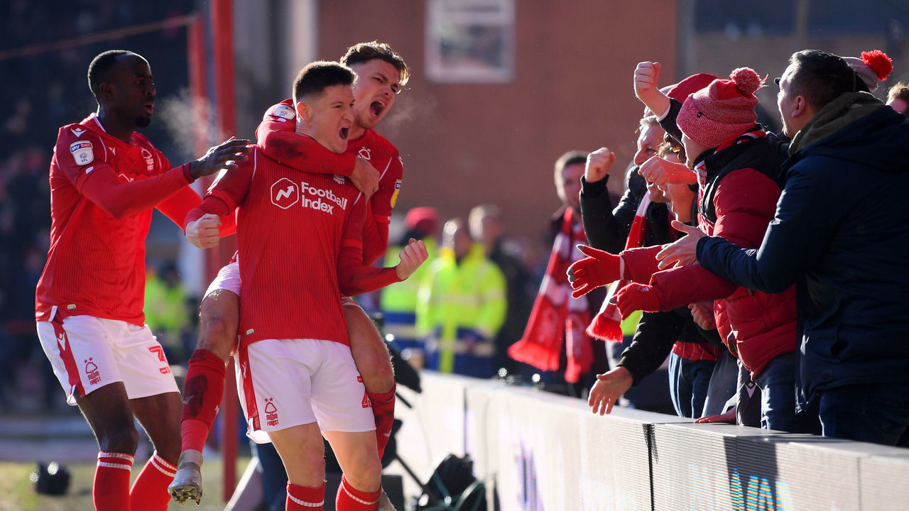 NOTTINGHAM, ENGLAND - JANUARY 19: Joe Lolley of Nottingham Forest is congratulated by Matty Cash after scoring the first goal during the Sky Bet Championship match between Nottingham Forest and Luton Town at City Ground on January 19, 2020 in Nottingham, England.