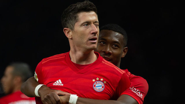 19 January 2020, Berlin: Football: Bundesliga, Hertha BSC - FC Bayern Munich, 18th matchday in the Olympic Stadium. Robert Lewandowski (l) of Bayern cheers his penalty kick for a 2-0 win with David Alaba. Photo: Soeren Stache/dpa-Zentralbild/dpa - IMPORTANT NOTE: In accordance with the regulations of the DFL Deutsche Fußball Liga and the DFB Deutscher Fußball-Bund, it is prohibited to exploit or have exploited in the stadium and/or from the game taken photographs in the form of sequence images and/or video-like photo series.