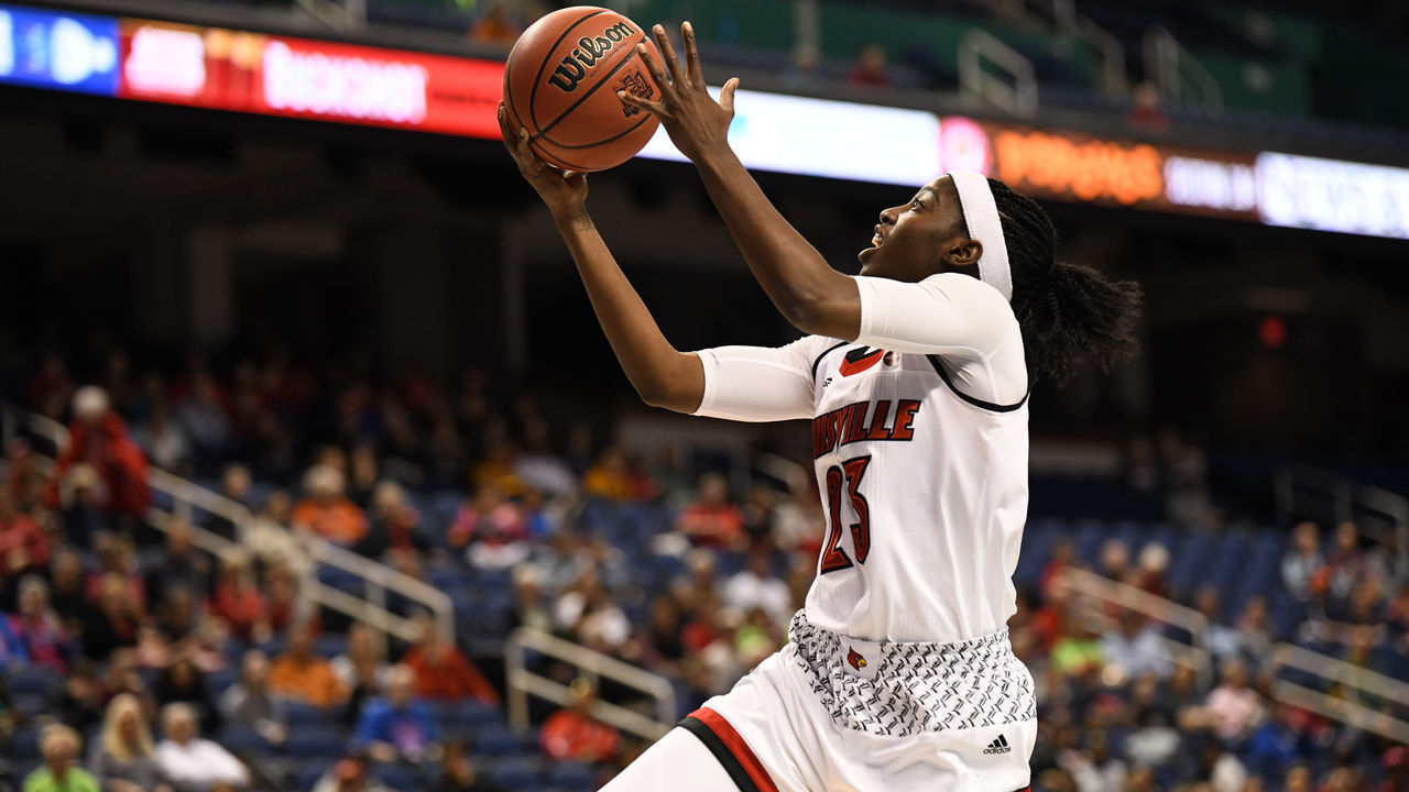 GREENSBORO, NC - MARCH 02: Louisville Cardinals guard Jazmine Jones (23) shoots an open layup during the ACC women's tournament game between the Virginia Tech Hokies and the Louisville Cardinals on March 2, 2018, at Greensboro Coliseum Complex in Greensboro, NC.