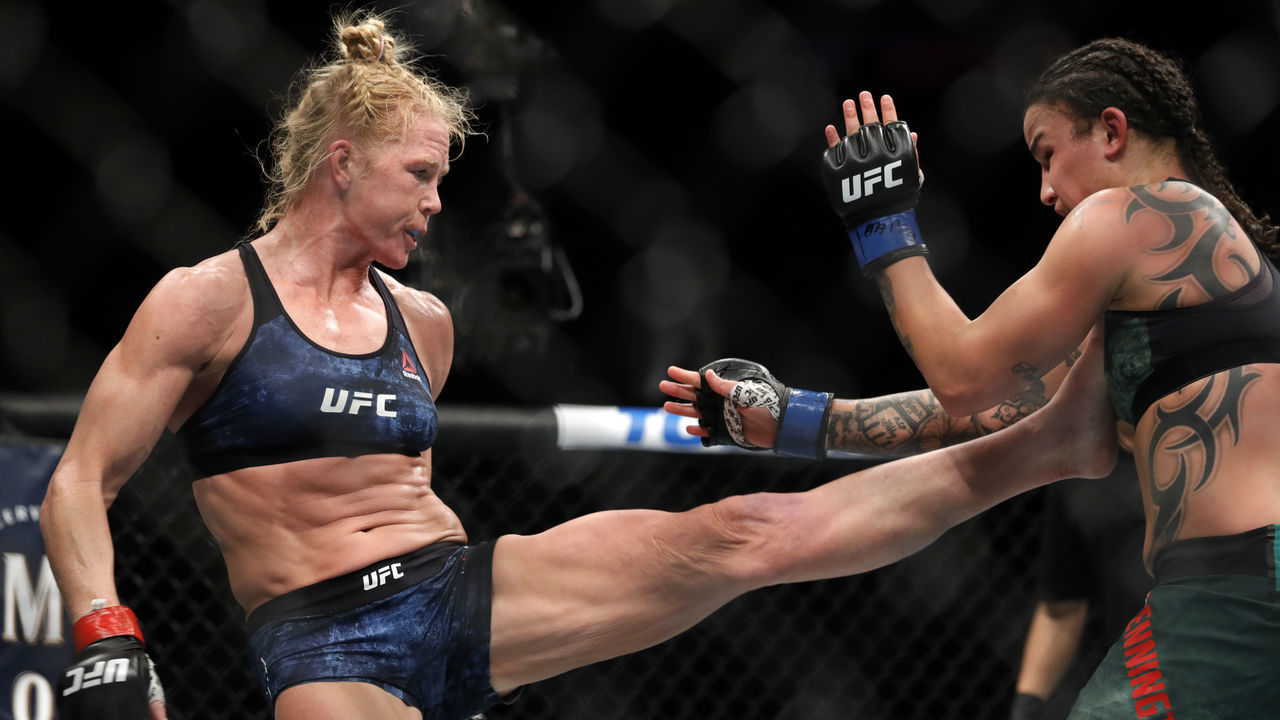 LAS VEGAS, NEVADA - JANUARY 18: Holly Holm (L) kicks Raquel Pennington in bantamweight bout during UFC 246 at T-Mobile Arena on January 18, 2020 in Las Vegas, Nevada.