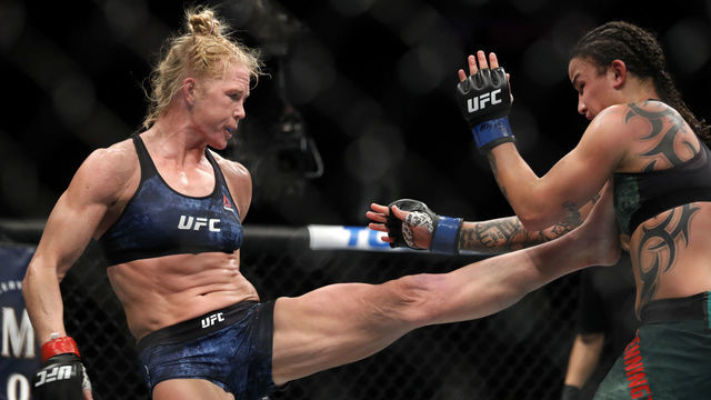 LAS VEGAS, NEVADA - JANUARY 18: Holly Holm (L) kicks Raquel Pennington in bantamweight bout during UFC 246 at T-Mobile Arena on January 18, 2020 in Las Vegas, Nevada.