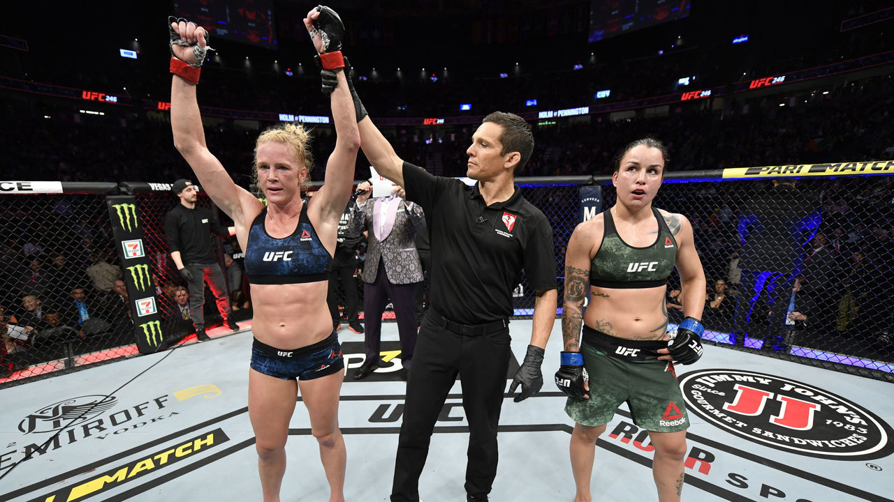 LAS VEGAS, NEVADA - JANUARY 18: Holly Holm has her hand raised in victory over Raquel Pennington in their bantamweight fight during the UFC 246 event at T-Mobile Arena on January 18, 2020 in Las Vegas, Nevada.