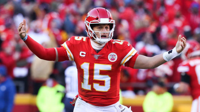 KANSAS CITY, MO - JANUARY 19: Kansas City Chiefs quarterback Patrick Mahomes (15) raises his arms in celebration after completing a 20-yard touchdown pass to wide receiver Tyreek Hill (10) in the second quarter of the AFC Championship game between the Tennessee Titans and Kansas City Chiefs on January 19, 2020 at Arrowhead Stadium in Kansas City, MO.