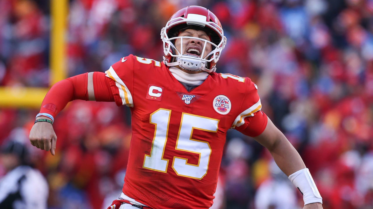 KANSAS CITY, MO - JANUARY 19: Kansas City Chiefs quarterback Patrick Mahomes (15) yells in celebration after completing a 20-yard touchdown pass to wide receiver Tyreek Hill (10) in the second quarter of the AFC Championship game between the Tennessee Titans and Kansas City Chiefs on January 19, 2020 at Arrowhead Stadium in Kansas City, MO.